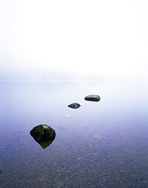 Three stones on the edge of Grasmere, Lake District National Park, Cumbria, England, United Kingdom, Europe