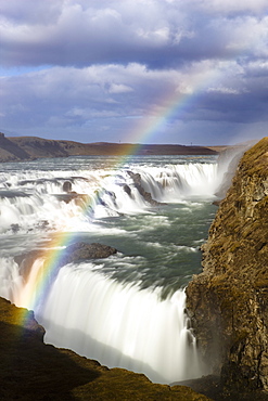 Gullfoss, Europe's biggest waterfall, with rainbow created by spray from the falls, near Reykjavik, Iceland, Polar Regions