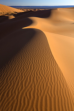 Orange sand dunes and sand ripples, Erg Chebbi sand sea, Sahara Desert near Merzouga, Morocco, North Africa, Africa