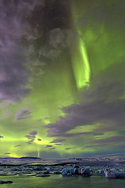 The Aurora Borealis (Northern Lights) captured in the night sky over Jokulsarlon glacial lagoon on the edge of the Vatnajokull National Park, during winter, South Iceland, Iceland, Polar Regions