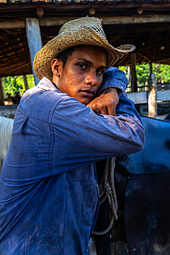 Cowboy with his horse (close up) at a farm near Trinidad, Cuba 4 (Model Release)