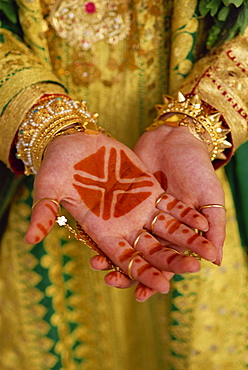 Traditional henna tattoos on hands of a young girl, Bahrain, Middle East