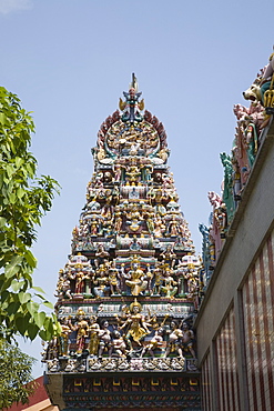 Ornate gopuram with colourful Hindu deities on Sri Veeramakaliamman Temple dedicated to goddess Kali built in Tamil style, Little India, Singapore, Southeast Asia, Asia