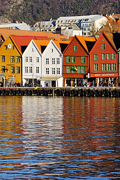 Traditional wooden Hanseatic merchants buildings of the Bryggen, UNESCO World Heritage Site, in harbour, Bergen, Hordaland, Norway, Scandinavia, Europe