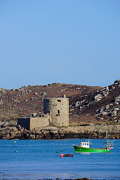 Fishing boat, Cromwell's Castle on Tresco, Isles of Scilly, England, United Kingdom, Europe