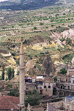 Minaret, volcanic tuff pillars and erosion surrounding Goreme, Cappadocia, Anatolia, Turkey, Asia Minor, Asia