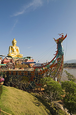 Huge golden Buddha on the banks of the Mekong River at Sop Ruak, Thailand, Southeast Asia, Asia