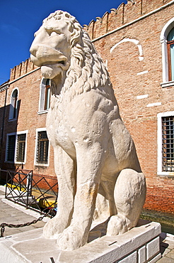 Greek antique lion statue outside the land entrance to the Arsenal, Venice, Veneto, Italy, Europe