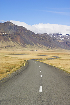 Mountains of Frodarheidi and empty Icelandic road, Snaefellsnes Peninsula, North West area. Iceland, Polar Regions