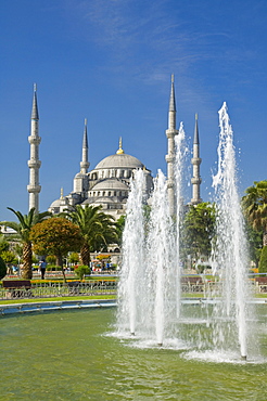 The Blue Mosque (Sultan Ahmet Camii) with domes and minarets, fountains and gardens in foreground, Sultanahmet, central Istanbul, Turkey, Europe