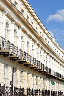 Row of Georgian Regency style terraced houses on St. Georges Road, Cheltenham Spa, Gloucestershire, England, United Kingdom, Europe