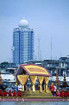 Thailand, Bangkok, The Chao Praya River, Royal Barge During The Yearly Parade, Oriental Style Skyscraper At Rear