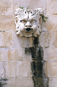 Croatia, Dalmatia, Dalmatian Coast, Fortified City Of Dubrovnik, Gargoyle On A Stone Wall