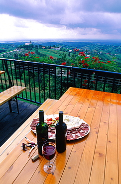 Croatia, Pljevisica Wine Region, Landscape On Vineyards, At Fore Wine And Charcuterie On An Inn Table