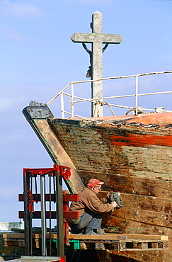 France, Normandy, Manche (50), Saintvaastlahougue, Old Wooden Fishing Boat Being Repaired