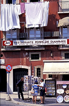 Portugal, Lisbon, Alfama Quarter, Post Cards Stall And Drying Linen