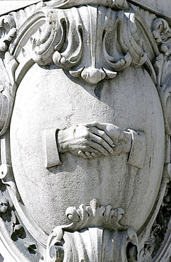 Portugal, Lisbon, Shaking Hands Carved At A Streets Corner