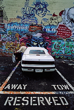 Los Angeles, California, Usa A Tagged Parking Lot & Convertible