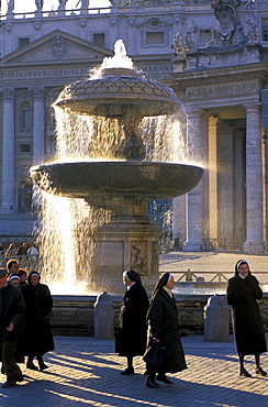 Italy, Rome, Vatican, St. Peterõs Square, Fountain Nuns Visiting