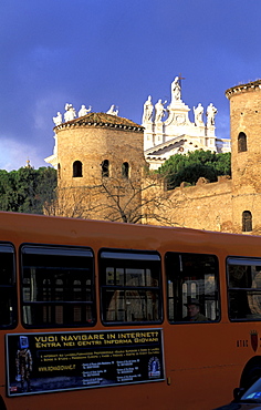 Italy, Rome, Bus At The Ramparts, Behind Is San Giovanni De Latrano Basilica