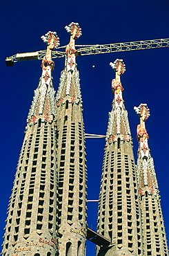 Spain, Catalonia, Barcelona, Sagrada Familia Church Under Construction Designed By Gaudi, The Belfries And Crane