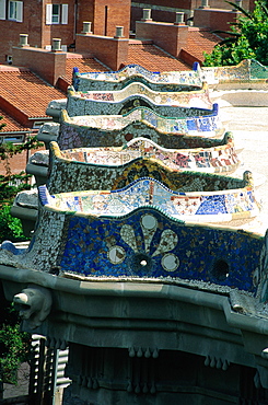 Spain, Catalonia, Barcelona, Park Guell Designed By Gaudi, Row Of Benches Covered With Mosaics