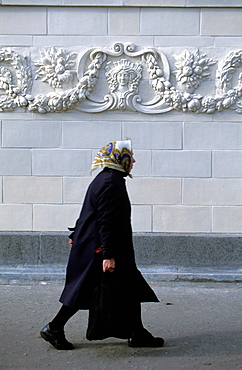 Russia, St Petersburg, An Old Babouchka (Old Woman) Passing By Kchessinskaia Museum 