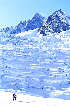 France, Alps In Winter, Haute Savoie, Chamonix, Lonesome Skier In Vallee Blanche Trail, Glacier Seracs Behind 