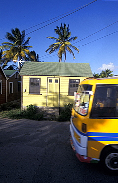 Caribbean, West Indies, Barbados, St Peter Parish, Fishermen Village Of Six Men's Bay, Colored Chattel House And Bus Passing By