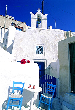 Greece, Cyclades, Santorini Island, Terrace Of A Micro Cafe, Two Blue Chairs And A Table, Belongs To A Very Old Man