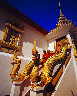 Staircase with Nagas (sacred snake) and two Buddhist monks, Wat Phrathat Doi Suthep, Chiang Mai, Thailand