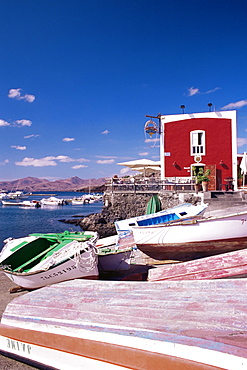 Boats and old red house in the old harbour, Puerto del Carmen, Lanzarote, Canary Islands, Spain, Atlantic, Europe