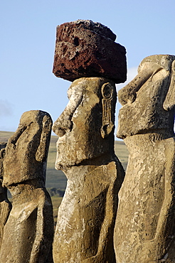 Three of the fifteen huge moai statues standing with their backs to the ocean, restored by archaeologists after destruction in 1960 by a tidal wave, Ahu Tongariki, Easter Island, UNESCO World Heritage Site, Chile, South America