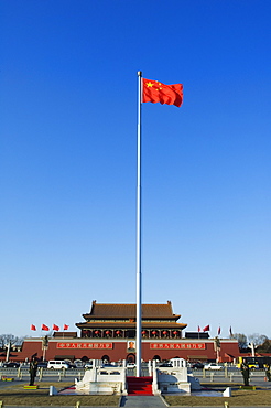 Chinese National flag infront of the Gate of Heavenly Peace in Tiananmen Square Beijing China