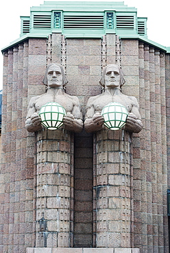 Art nouveau statues designed by Emil Wikstrom at Rautatieasema Train Station, Helsinki, Finland, Scandinavia, Europe