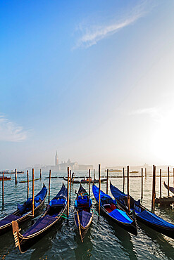 Gondola and San Giorgio Maggiore Church across Basino di San Marco, Venice, UNESCO World Heritage Site, Veneto, Italy, Europe