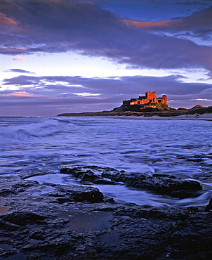 Bamburgh Castle at dusk, Northumberland, England