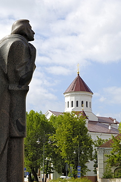 Statue of Adam Mickiewicz with Church of the Holy Mother of God in the background, Vilnius, Lithuania, Baltic States, Europe