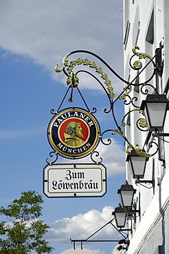 Wrought iron sign advertising Paulaner and Lowenbrau beer, Wolfrathausen, near Munich, Bavaria, Germany, Europe