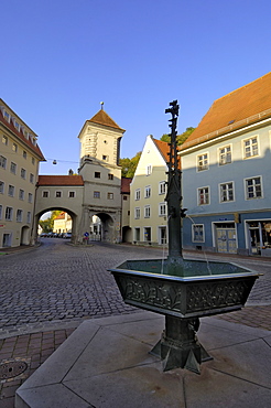 Fountain and the Sandauertor (Sandau Gateway) in the city walls, Landsberg am Lech, Bavaria (Bayern), Germany, Europe