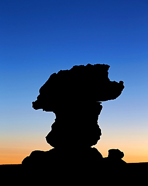 Silouetted sandstone formation at dawn, Coyote Buttes Wilderness, Vermilion Cliffs National Monument, Arizona, United States of America, North America