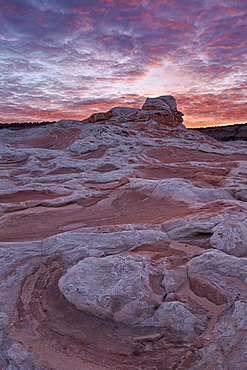 Red clouds over sandstone at sunrise, White Pocket, Vermilion Cliffs National Monument, Arizona, United States of America, North America