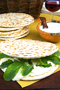 Piadina flat bread with rucola (rocket) and stracchino cheese, typical Emilia Romagna food, Piadina, Emilia Romagna, Italy, Europe