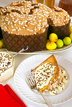 Colomba cake (dove cake) with cream sauce, an Italian speciality for Easter Day, Italy, Europe