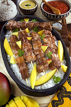 Madagascan food, mosakiki, zebu skewers with mango and rice, Madagascar, Africa