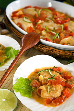 Brazilian fish Moqueca (fish with tomatoes, garlic and lime juice), Brazil, South America