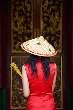 Chinese woman at the Man Mo Temple, Hong Kong, China, Asia