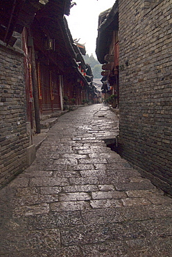 Early morning cobbled street, Lijiang old town, UNESCO World Heritage Site, Yunnan, China, Asia