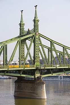 Tram on Szabadsag Bridge crossing the Danube, Budapest, Hungary, Europe