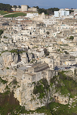 View of Chiesa di San Pietro Caveoso in the Sassi area of Matera and the ravine, Basilicata, Italy, Europe